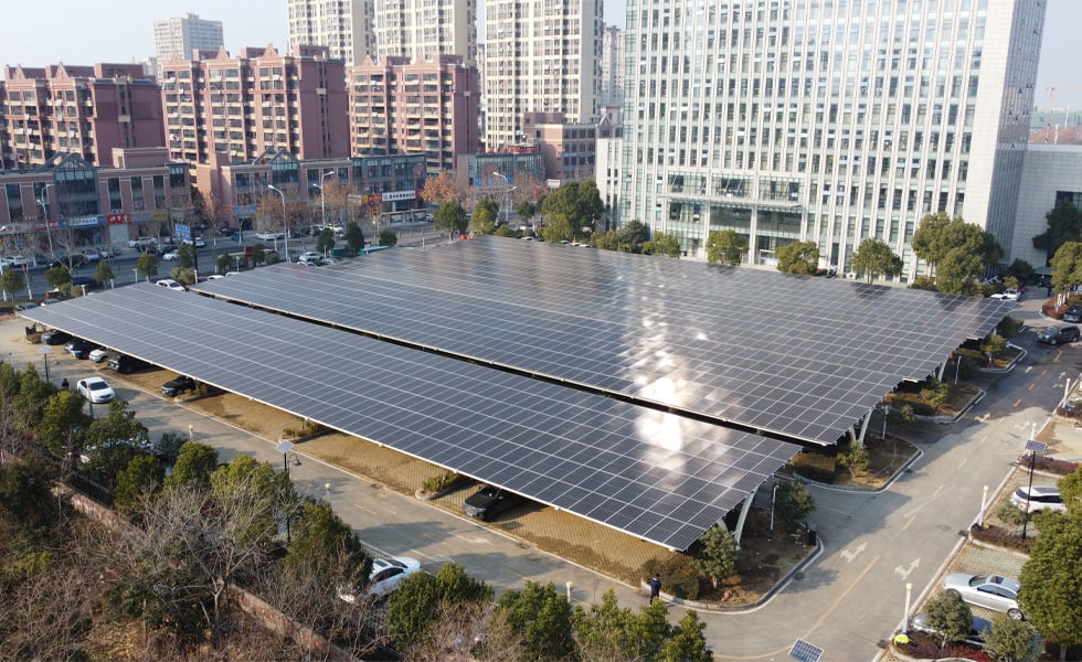 Solar Carport: Parking and Power Generation, Where 1+1 > 2